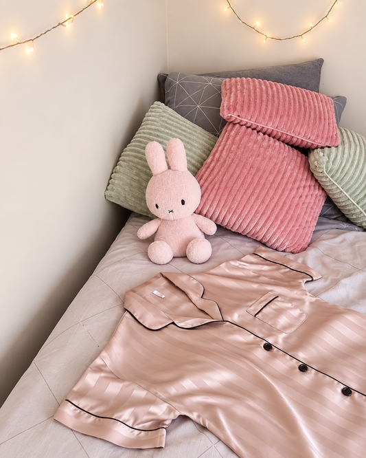 Comfy Bedroom Nook with Pajamas on the bed